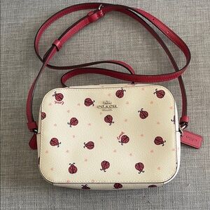 Coach Cream Crossbody Bag with Red Ladybug Print